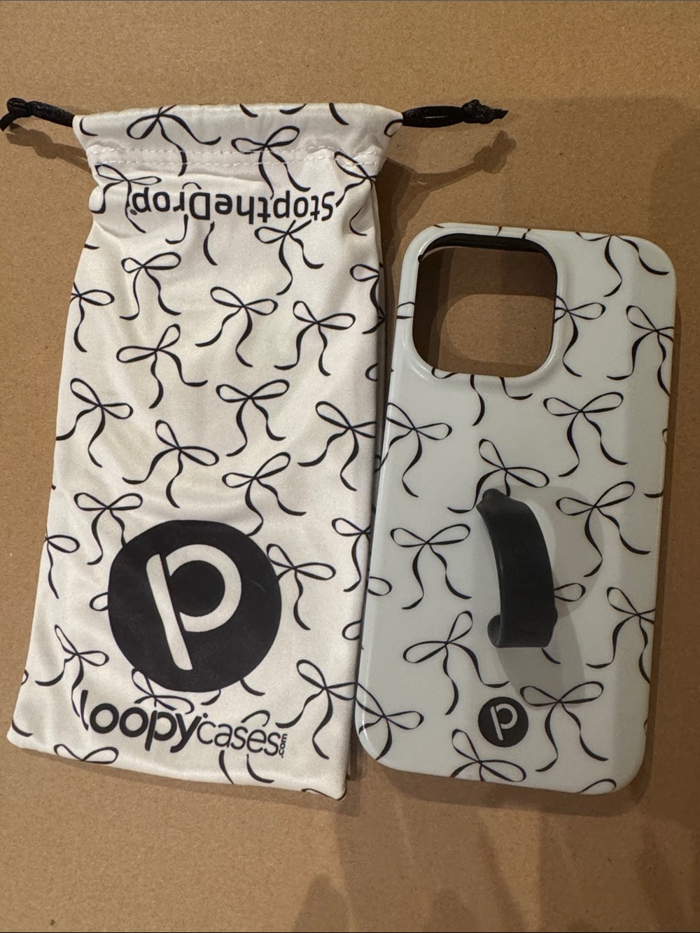 Loopy Case White Bow Pattern iPhone 13 PRO Case with Black Loopy Grip